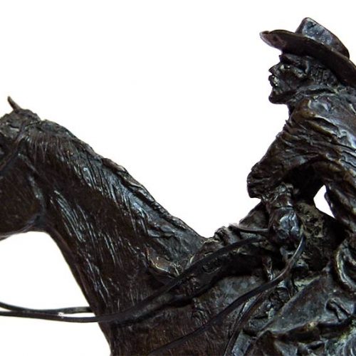A western bronze sculpture horse and rider a sculpture by Jasper D'Ambrosi titled Holdin Herd