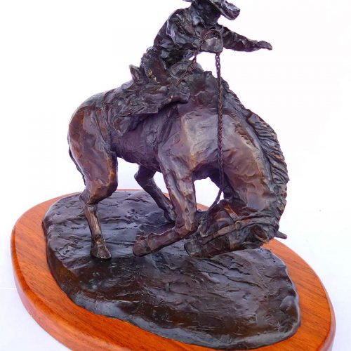 'Go On With It' Limited edition, a cowboy on bucking horse bronze sculpture by L. Soderburg available from Sculpture Collector