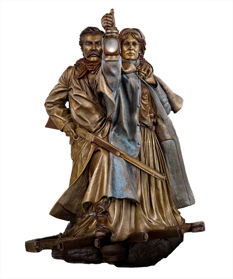 The Lighted Lantern a life-size bronze sculpture of Pioneers by James Muir