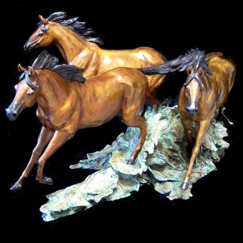 Freedom a bronze equine sculpture of Horse's stampeding by Marie Barbera