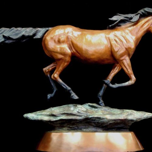 Thunder a bronze horse at gallop by MaMarie’s longtime interest in horses lead her wanting to sculpt a contemporary sculpture of a horse at full gallop by Marie Barbera